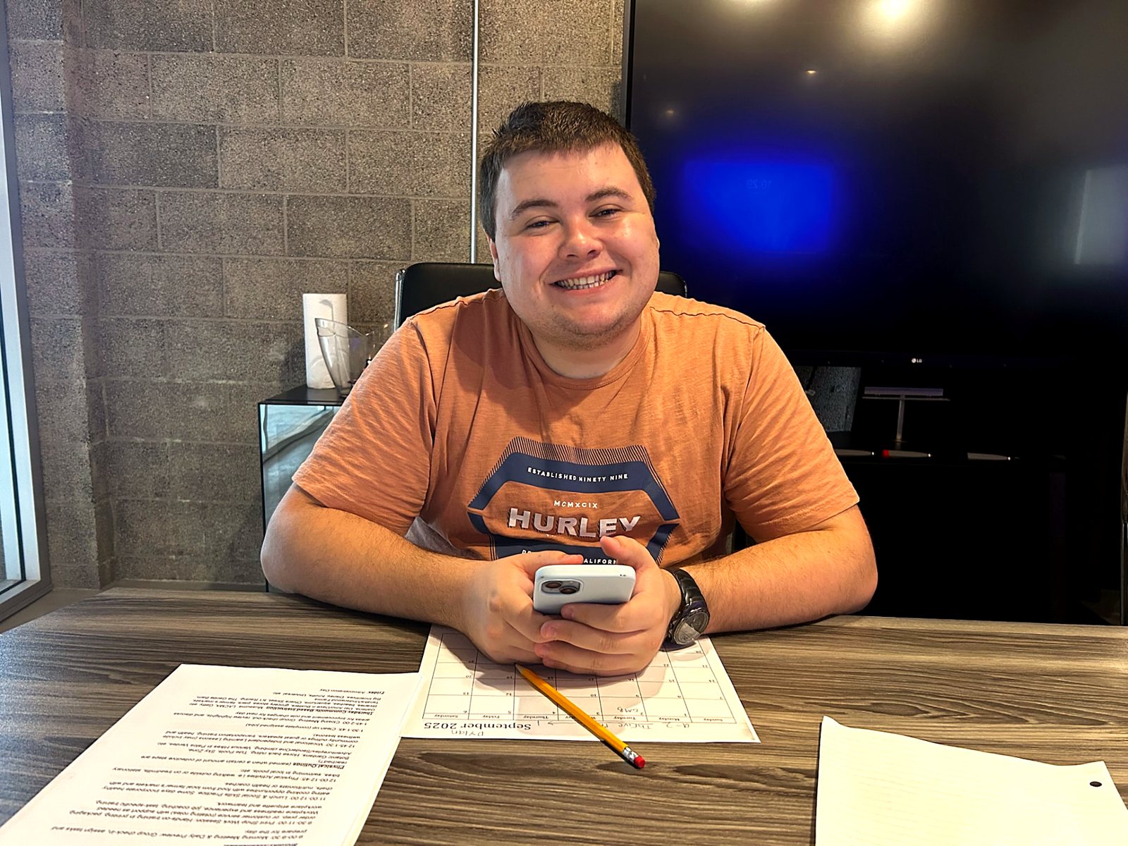 A participant working through a paper task at a desk